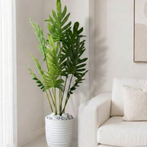 Sublimez votre intérieur avec ce Philodendron Xanadu artificiel de 1,60 m. Livré dans un magnifique pot en céramique blanc strié. Prix : 139 DT seulement.
